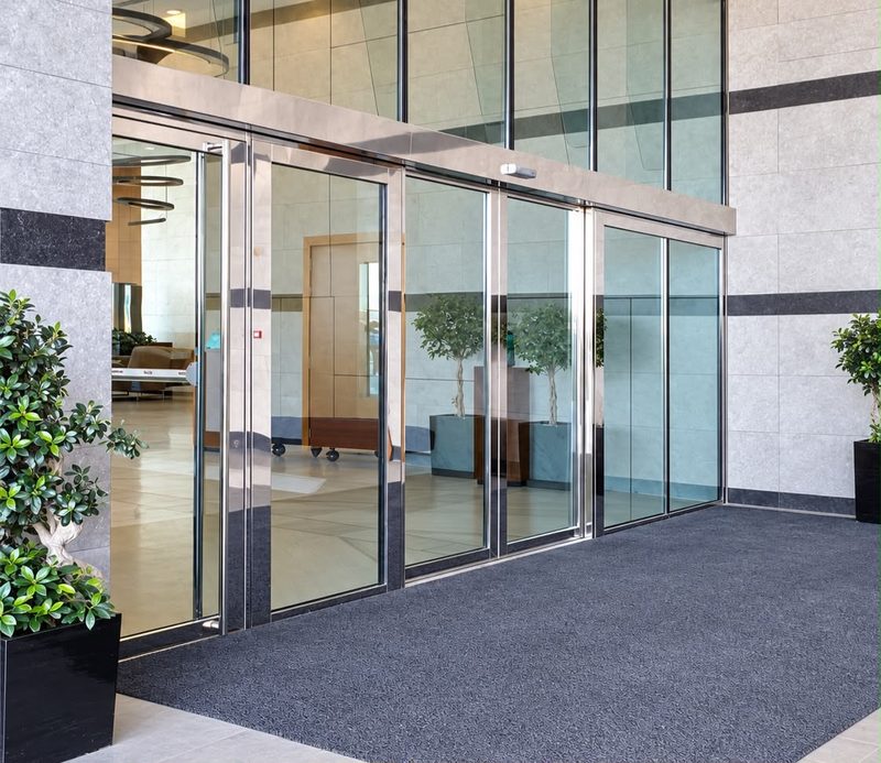 Automatic sliding glass doors
